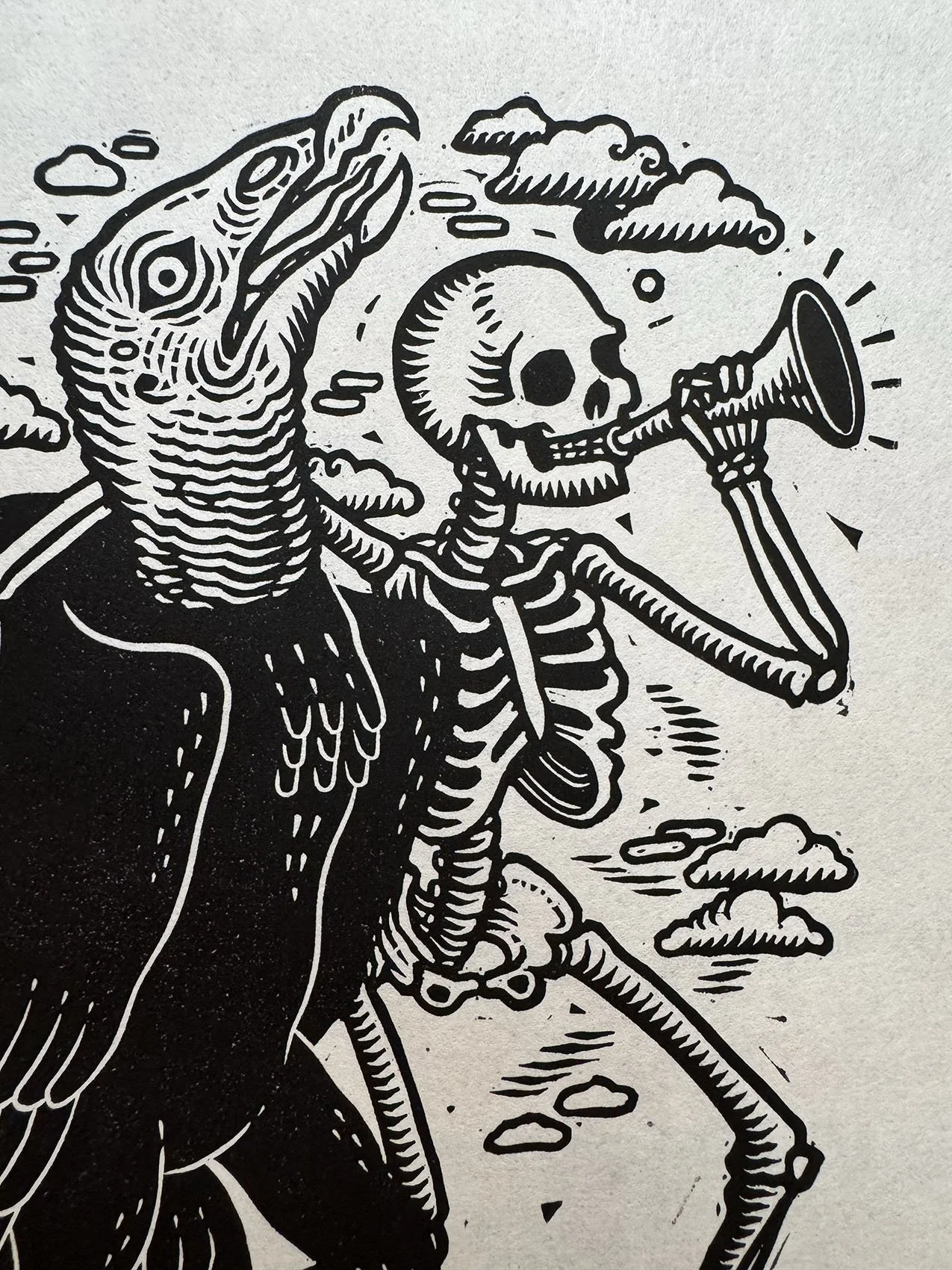 Skeleton and vulture, linocut on paper — Kathleen Neeley